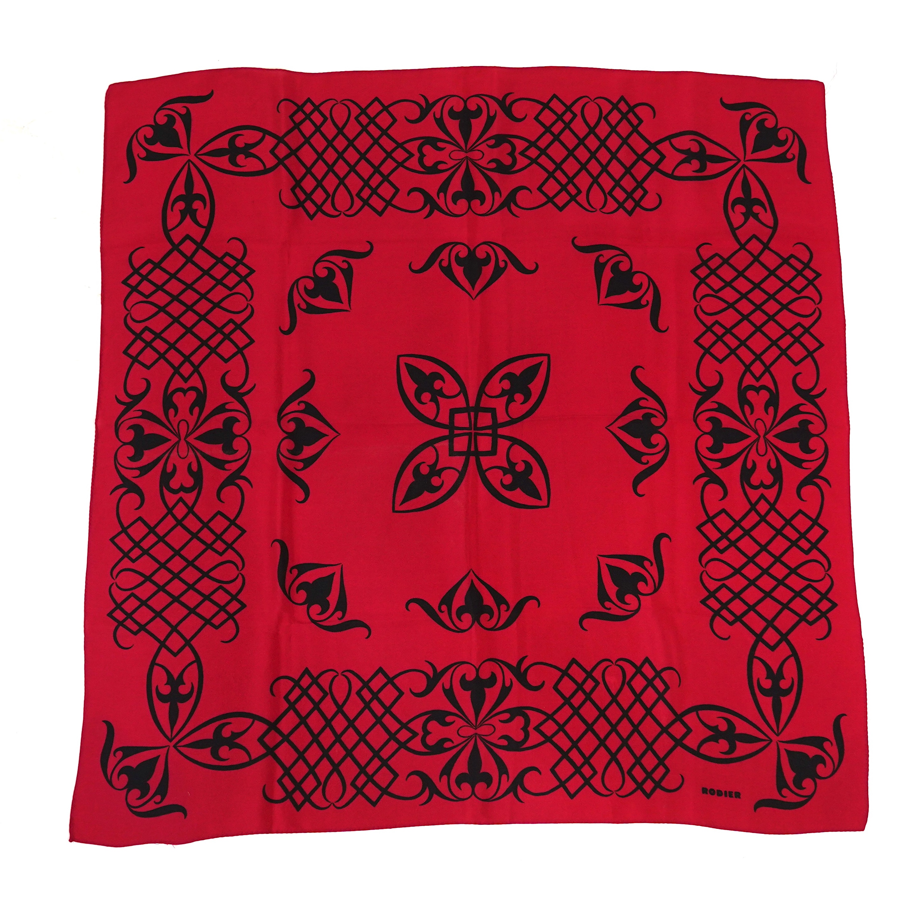 A Yves Saint Laurent silk scarf, a Jean Cocteau zodiac design silk scarf and a Rodier silk scarf.